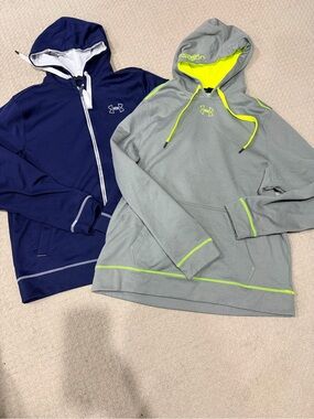 2 Men’s UA large sweatshirts.